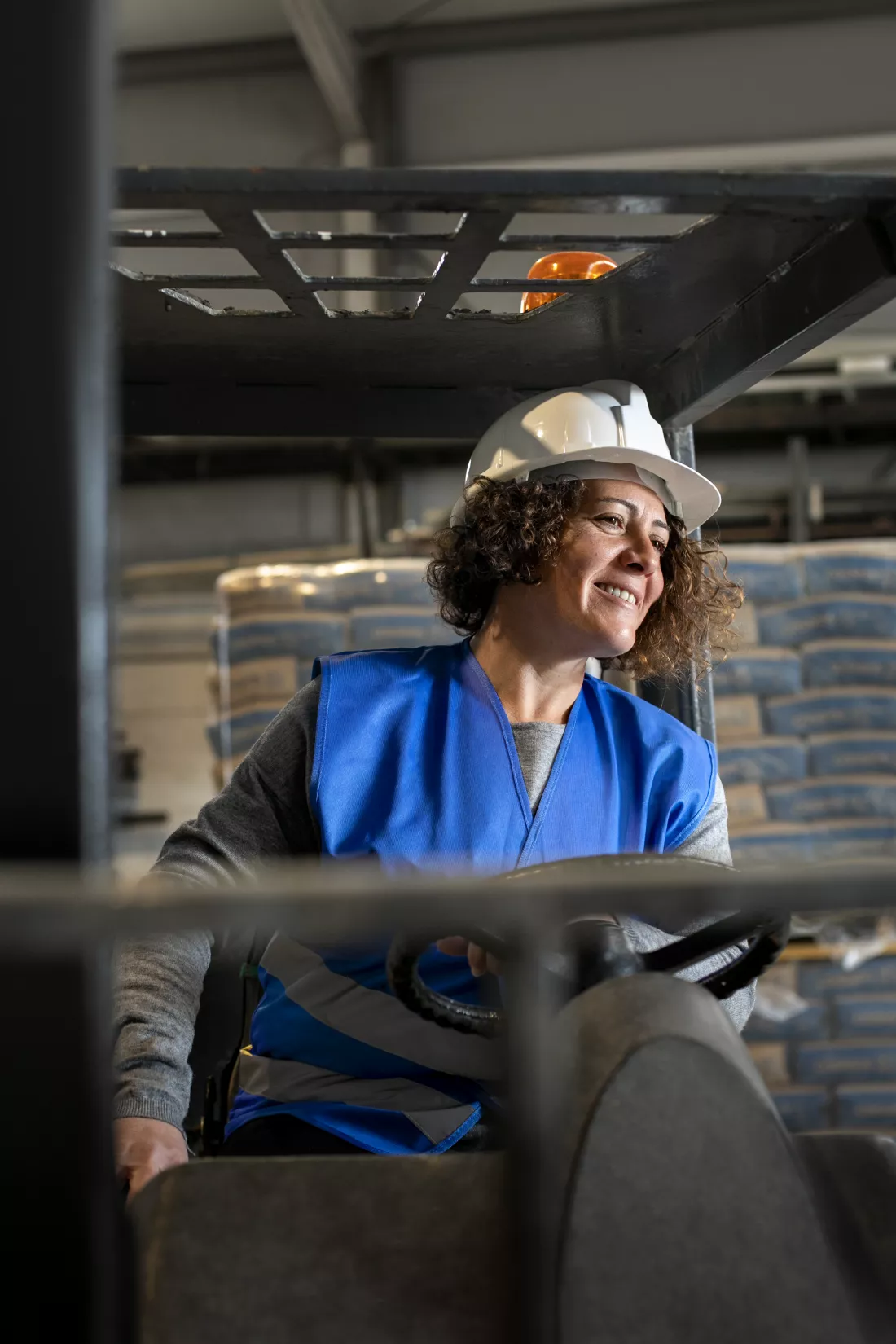 professional-female-driver-operating-forklift-vehicle